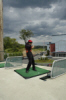 Adam golfing? Well, trying.