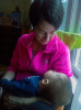 1/16 - Teresa taking care of her new nephew.