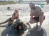 7/30 - We burried Hailey in the sand.