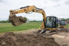 5/28 - Mason's picking up a big rock!