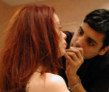 1-21-2002  Make up artist doing the lipstick.