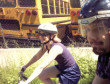 5-26-2002  going for a bicycle ride behind bus butts.