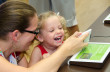 A Little Girl Plays Kinectimals on a Windows Phone